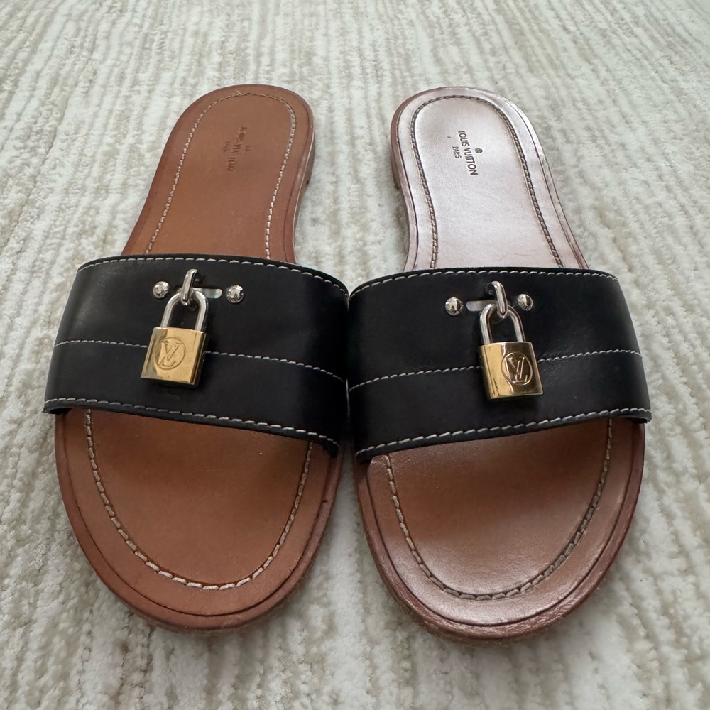 Louis Vuitton Lock It Leather Slides Mules Black size 38